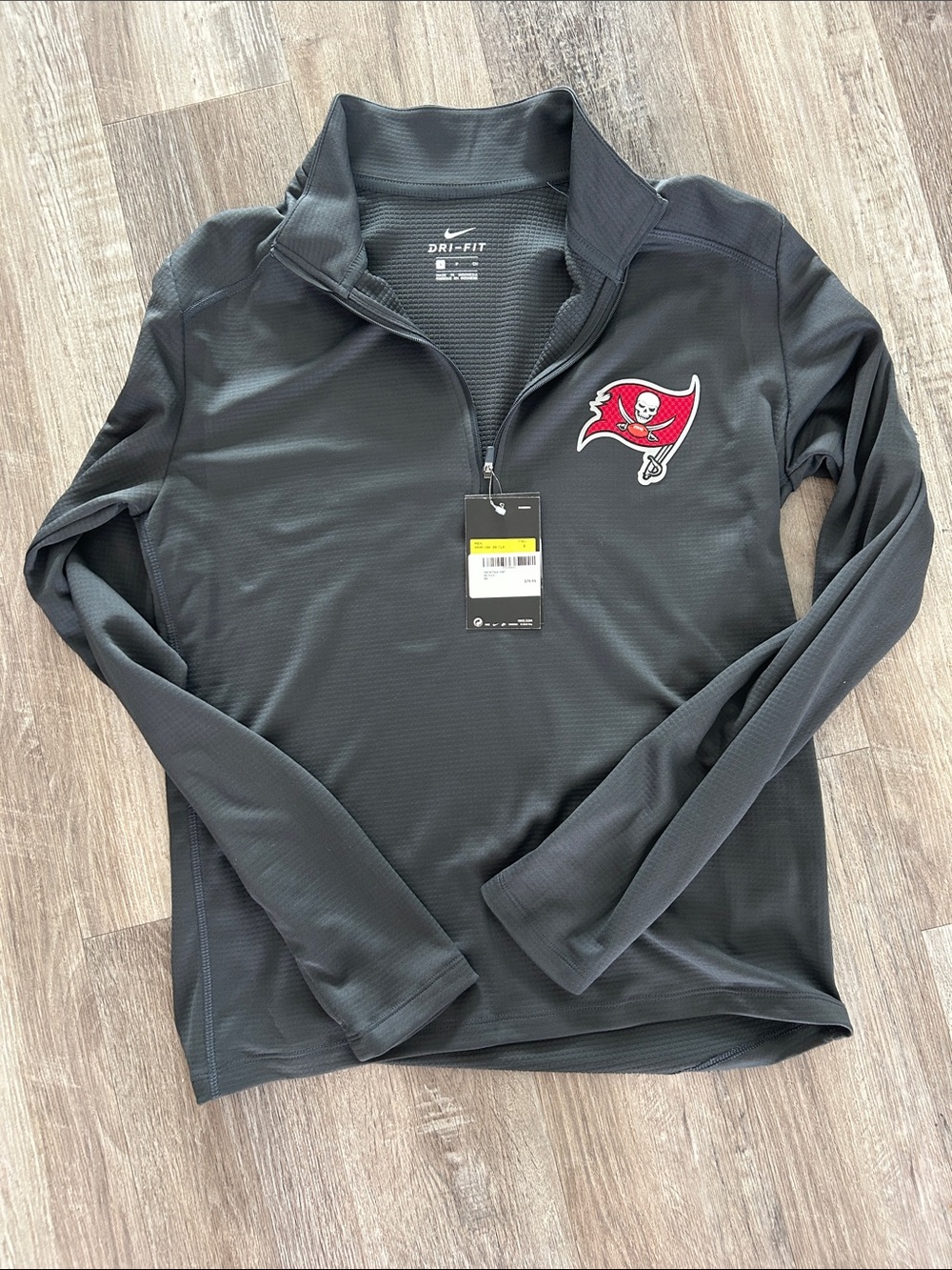 Nike Men's Black Quarter-Zip Pullover with Red Buccaneers Crest